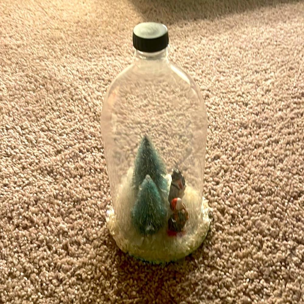 Holiday snow scene with tree